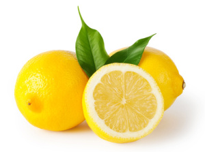 Three lemons with leaves